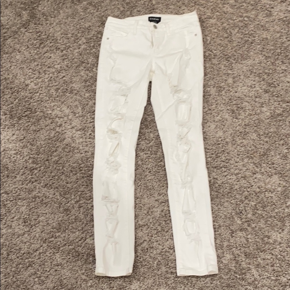 Bebe ripped white jeans